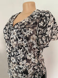 Black and white floral blouse